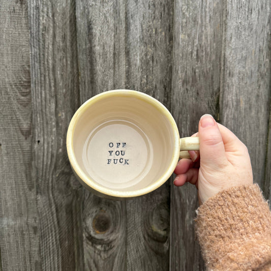 ‘OFF YOU FUCK’ stamped mug